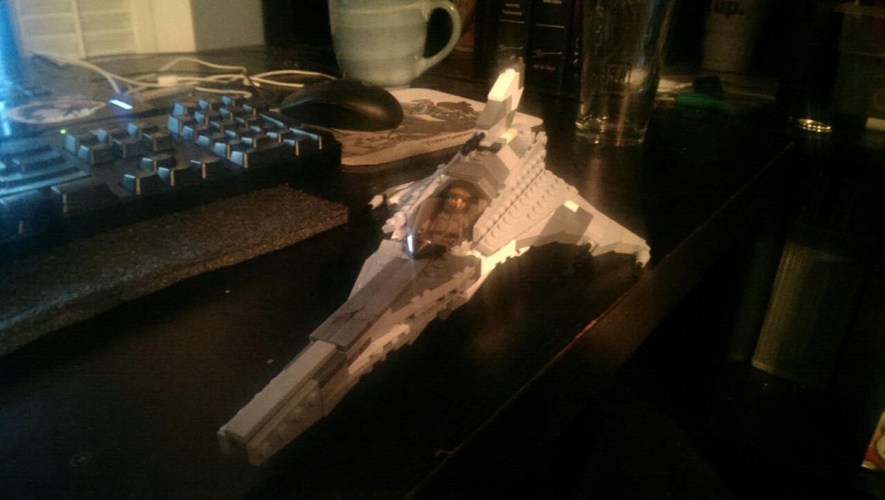 Say hello to the Colonial Viper Mk. VII.

Didn't take me too long to finish. Im having some pretty bad parts shortages, so theres a LOT of discolored parts, but its all constructed. Man, its gorgeous. I love it when i get the urge to build lego stuff.