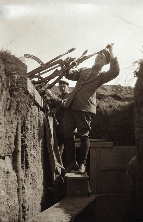  A German soldier in the trenches loads a grenade on a rod into a rifle as a makeshift mortar, 1915. Shot by Lt. Walter Koessler of the 10th Reserve Artillery Battalion between 1914 and 1918One of my favorite photos that Ive been meaning to post. The link below (and the source link) should definitely be checked out since there quite good Articles/stories! <a href=