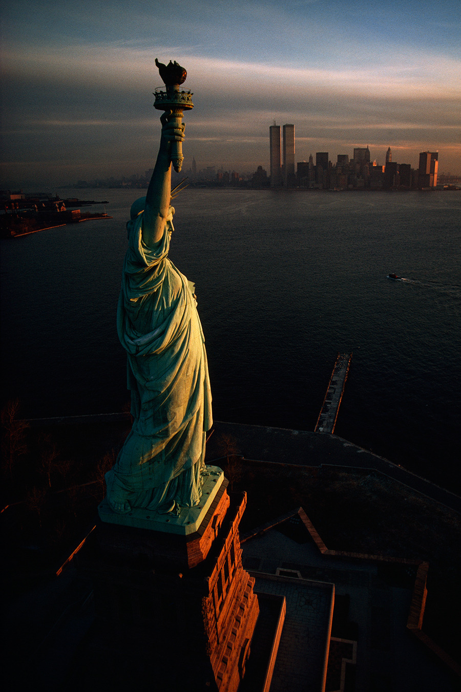 The Statue of Liberty hails dawn over New York Harbor in 1978.Photograph by David Alan Harvey, National Geographic Creative