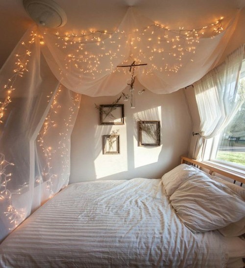 soft canopy bed + fairylights = cuteness!
