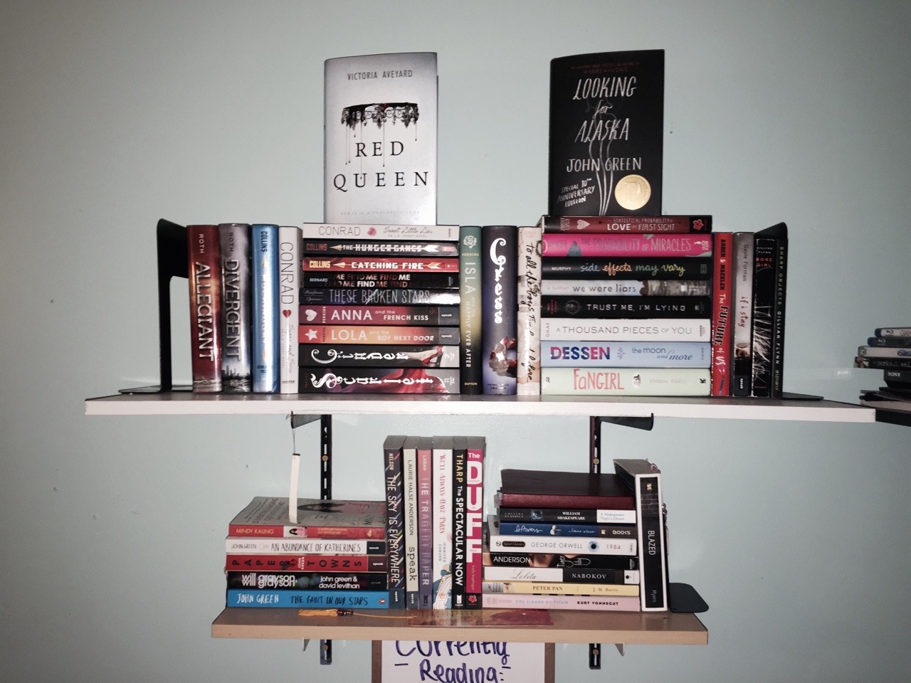 I ADORE my new book shelf set up. 
I didn&rsquo;t have a real spot for Red Queen nor LfA but they&rsquo;re probably my fav books that I own (though I have yet to read Red Queen) so it&rsquo;s fitting that they get they&rsquo;re own lovely spots.