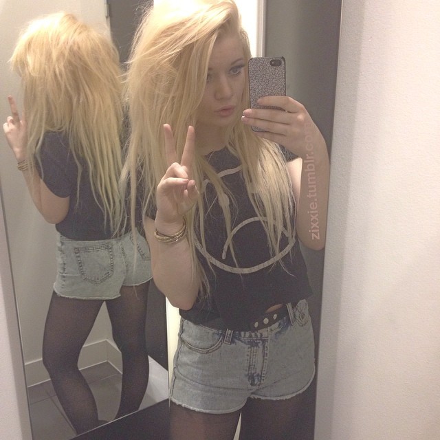 two of me ✌️🌸 #me #selfie #blonde #girl #shorts #sad #tshirt #urbanoutfitters #h&amp;m #changingrooms #longhair #blondehair #pose #peace