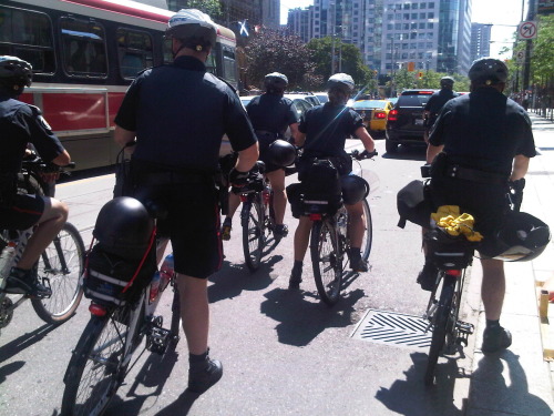 Pre-G20 traffic jam includes police on bicycles, as well as automotive vehicles. Walking is fastest, at King Street westbound at University Avenue (Saturday, Toronto) 20100619&#160;1600