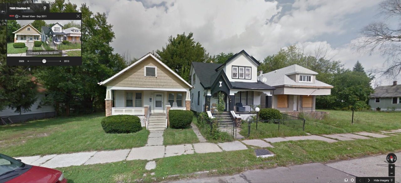The two on the right are City of Detroit owned. The middle one sold for $47,000 in 2006. Since then, tax foreclosure and, clearly, a fire.