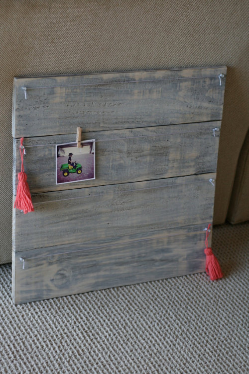 Rustic Instagram Photo Board
This rustic wood photo display board is handmade from reclaimed bards. The boards have been sanded, stained and sealed to create that rustic modern look that fits perfect right into your home decor. We love to use those cute little close-pins to hang photos with (close pins not included). The colors are cream, and coral with a hint of gold. Great for hanging your instagram photos, cards, to do lists or notes. The pictures in the photo were printed from the app &#8220;Print Studio&#8221; We love their 4x4&#8221; matte photos. Such a great way to see all those awesome pics you take on your smart phone. This board is 22&#8221; x 22&#8221; and is ready to hang once you receive it.
Purchase here. 