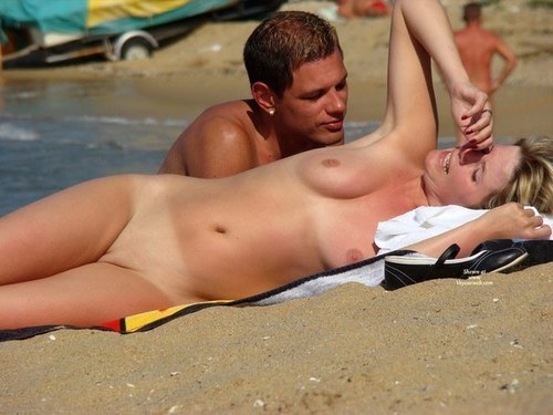 Nude on beach voyeur