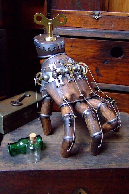 odditiesoflife: Addams Family’s Thing Recreated Known as the Magnanimous and Beneficent Doctor Warthan, he claims to “disseminate the propaganda of SteamPunk Art.” He built his Thing for an Addams Family themed exhibition at the Wootini Gallery in Carrboro, North Carolina. 